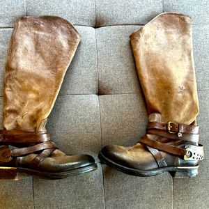 Beautiful Airstep leather boots with straps and buckle..